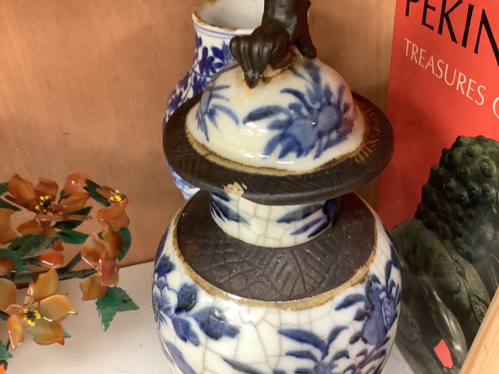 A 19th century Chinese blue and white vase, a similar crackle glaze vase and a powder blue jar, mounted as a lamp, tallest 32cm